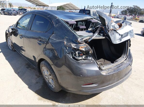 3MYDLBYV6HY195030 2017 TOYOTA YARIS IA Gray Trasero izquierdo