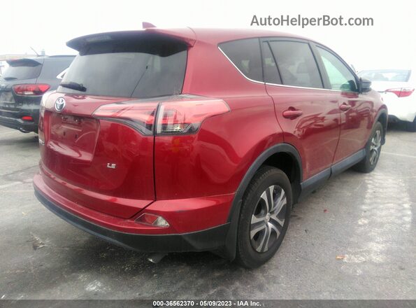 2T3ZFREV9JW494077 2018 TOYOTA LE Maroon Front view