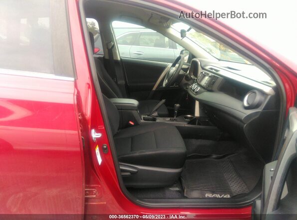 2T3ZFREV9JW494077 2018 TOYOTA LE Maroon Front interior view