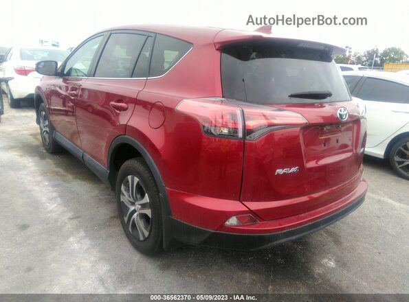 2T3ZFREV9JW494077 2018 TOYOTA LE Maroon Rear left