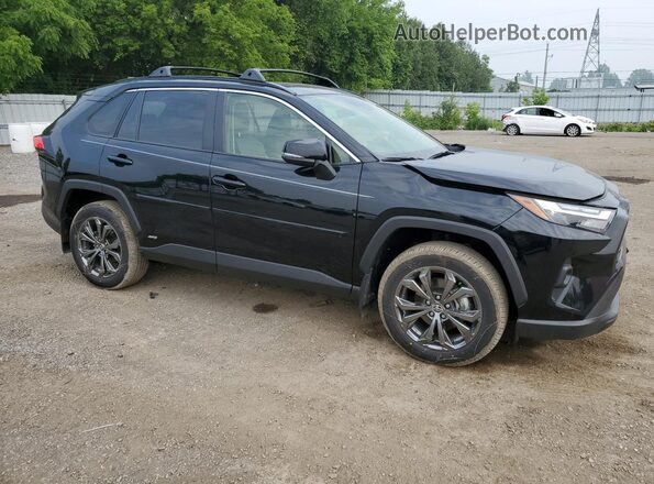 JTMB6RFV6ND078099 2022 TOYOTA LE Black Widok wnętrza z przodu