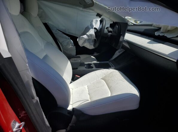 5YJ3E1EC2NF310604 2022 TESLA MODEL Red Front interior view