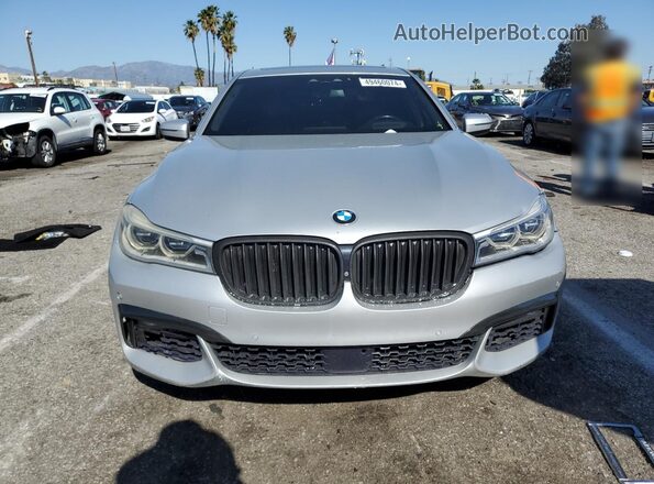WBA7F2C54GG417202 2016 BMW 7 SERIES Серебряный Вид салона спереди