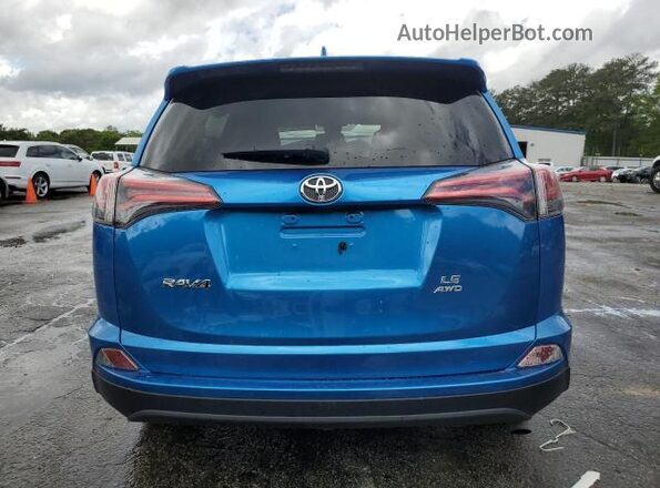 JTMBFREV4JJ213433 2018 TOYOTA LE Blue Rear view