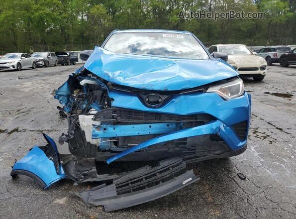 JTMBFREV4JJ213433 2018 TOYOTA LE Blue Front view