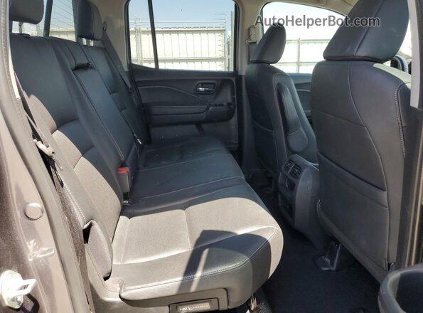 5FPYK3F50PB016610 2023 HONDA RIDGELINE Gray Vista de los asientos traseros