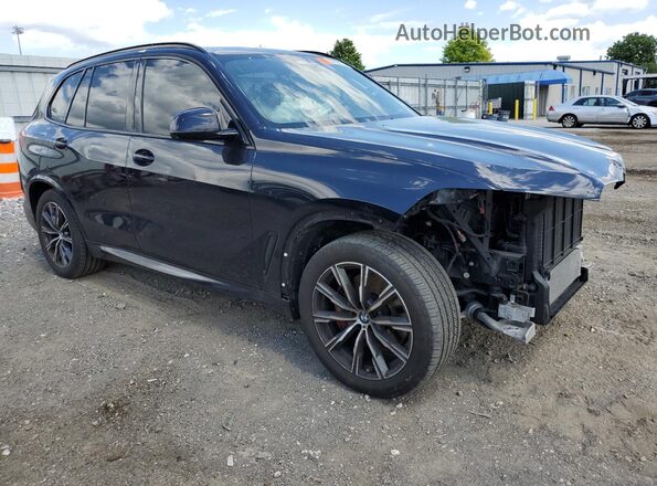 5UXCR6C07N9J93993 2022 BMW X5 Blue Front interior view