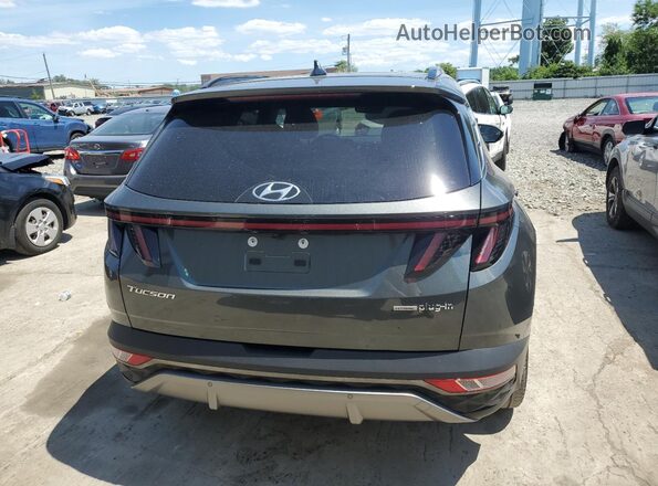 KM8JFDA23NU052177 2022 HYUNDAI TUCSON Black Հետևի տեսք