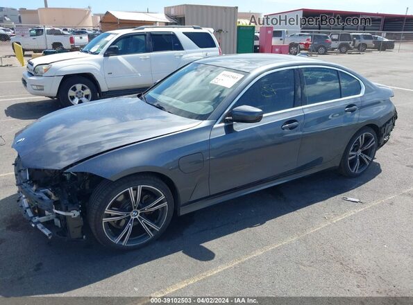 3MW5P7J03M8B58527 2021 BMW 3 SERIES Gray Vista tres cuartos delantera izquierda