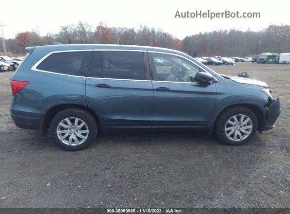 5FNYF6H14KB090906 2019 HONDA PILOT Light Blue Widok wnętrza z tyłu