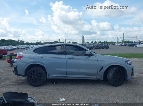 5UX33DT07R9V14782 2024 BMW X4 Gray უკანა სალონის ხედი