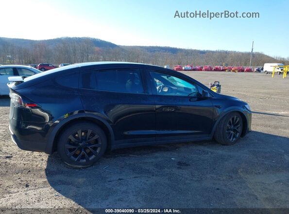 7SAXCDE57PF408446 2023 TESLA MODEL X Black Սալոնի հետևի տեսք