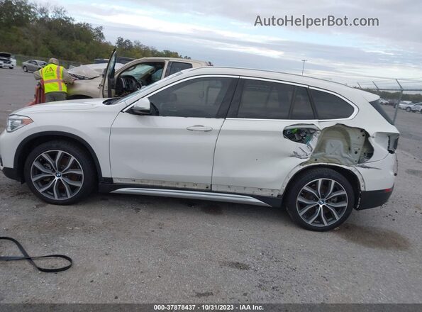 WBXHT3C57K5L37213 2019 BMW X1 White 360 interior view
