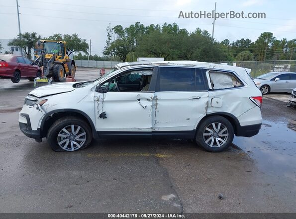 5FNYF6H53MB094161 2021 HONDA PILOT White Widok wnętrza z tyłu