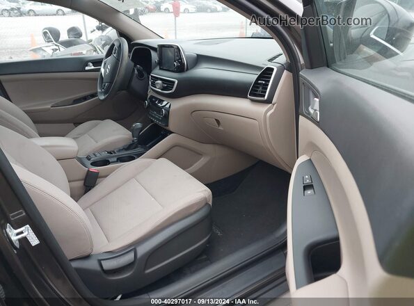 KM8J33AL1KU054372 2019 HYUNDAI TUCSON Gray Front interior view