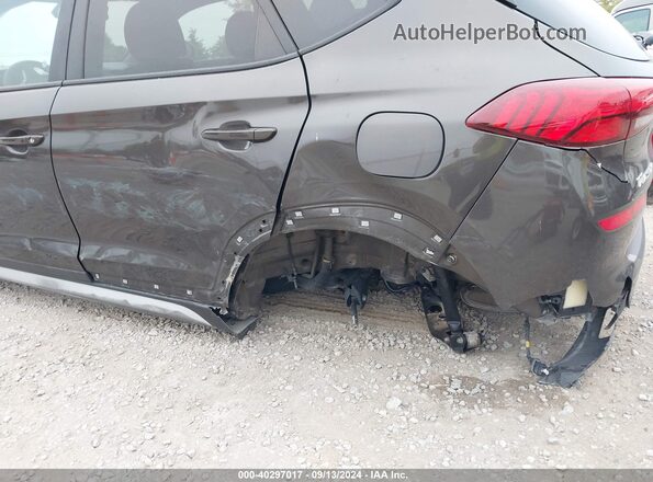 KM8J33AL1KU054372 2019 HYUNDAI TUCSON Gray Front view