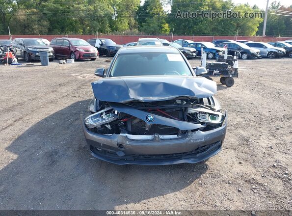WBA8E5G57JNV02900 2018 BMW 3 SERIES Gray ხელსაწყოთა პანელის ხედი