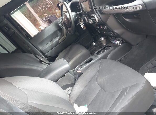 1C4BJWDG9GL233884 2016 JEEP WRANGLER UNLIMITED Черный Вид салона спереди