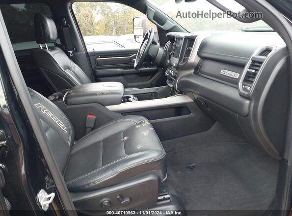 1C6SRFLT6LN204534 2020 RAM 1500 Black Front interior view