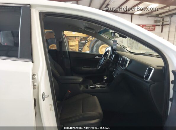 KNDPM3AC6M7931337 2021 KIA SPORTAGE White Widok wnętrza z przodu