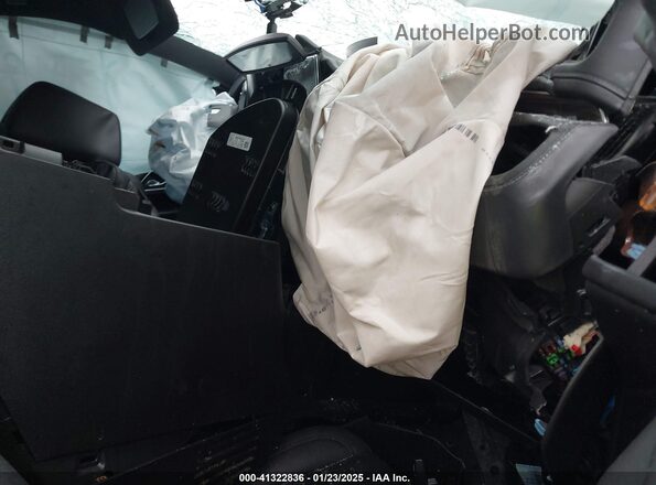 1GNSCCKD4PR378515 2023 CHEVROLET SUBURBAN Black Front interior view