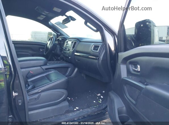 1N6BA1F48KN512968 2019 NISSAN TITAN XD Black Вид салону спереду
