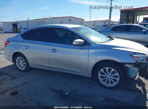 3N1AB7AP2KY369375 2019 NISSAN SENTRA Silver Вид задньої частини салону