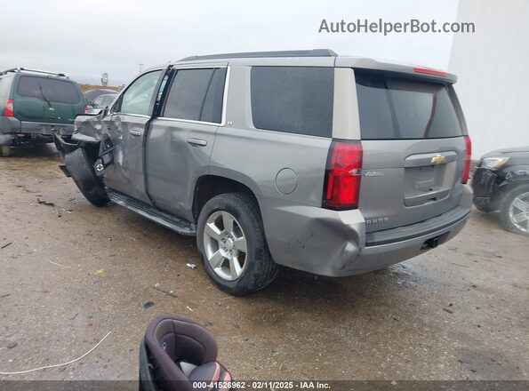 1GNSCBKC7KR264194 2019 CHEVROLET TAHOE Gray Trasero izquierdo