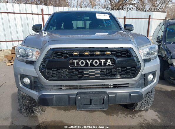 3TMCZ5AN8KM208475 2019 TOYOTA TACOMA Silver ხელსაწყოთა პანელის ხედი