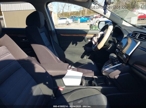 7FARW1H52ME013663 2021 HONDA CR-V Blue Front interior view