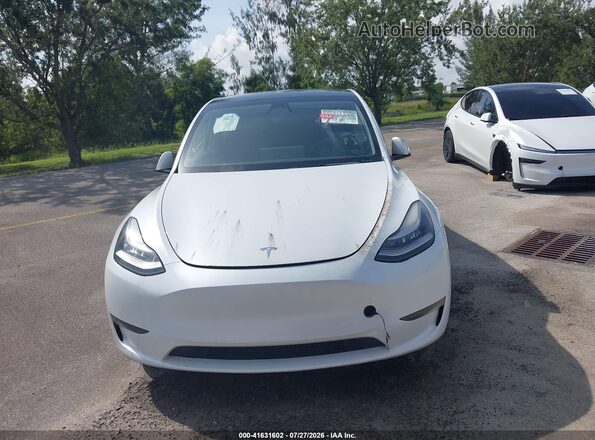 7SAYGDEE3PA123054 2023 TESLA MODEL Y White Vista interior trasera