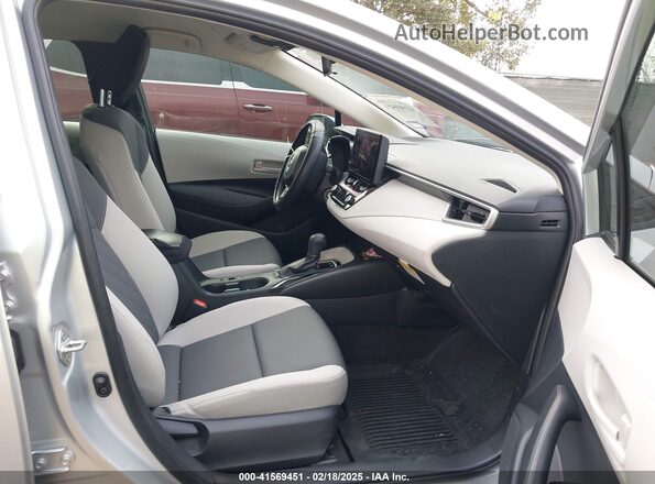 JTDBCMFE7R3045393 2024 TOYOTA LL Silver Вид салону спереду