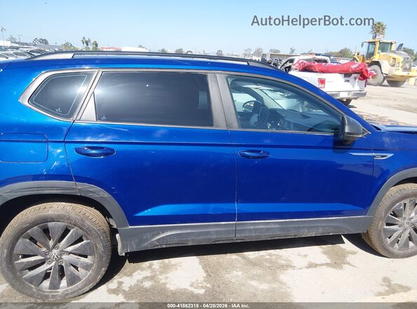 3VVCX7B22PM337388 2023 VOLKSWAGEN TAOS Blue Vista interior trasera