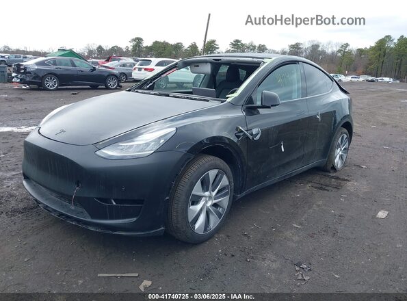 7SAYGDEE2PA187134 2023 TESLA MODEL Y Black Front view