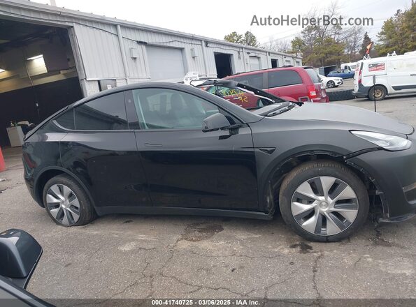 7SAYGDEE2PA187134 2023 TESLA MODEL Y Black Rear interior view