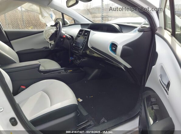 JTDL9MFU3M3030604 2021 TOYOTA LE White Vista interior delantera
