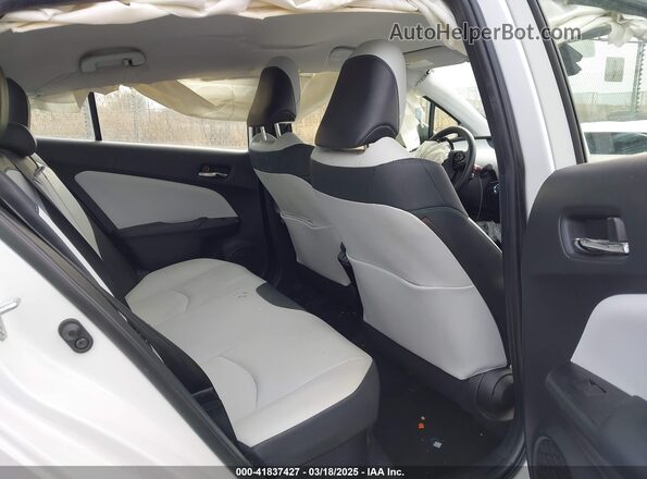 JTDL9MFU3M3030604 2021 TOYOTA LE White Vista de la etiqueta del VIN
