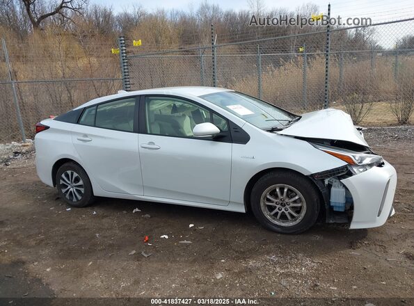 JTDL9MFU3M3030604 2021 TOYOTA LE White Vista interior trasera