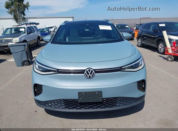 1V25MPE88RC007449 2024 VOLKSWAGEN ID.4 Light Blue Вид задней части салона