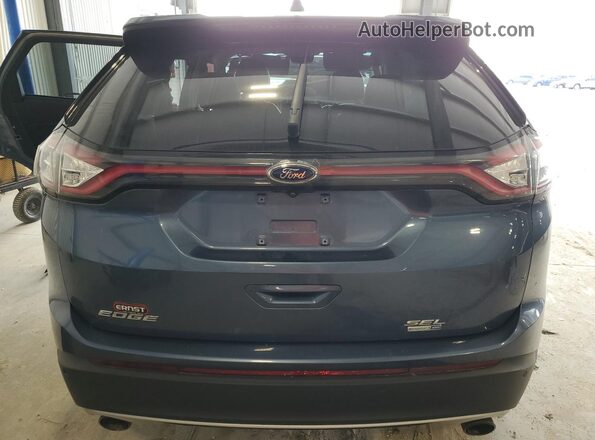 2FMPK4J94JBC05877 2018 FORD EDGE Blue Widok naklejki z numerem VIN