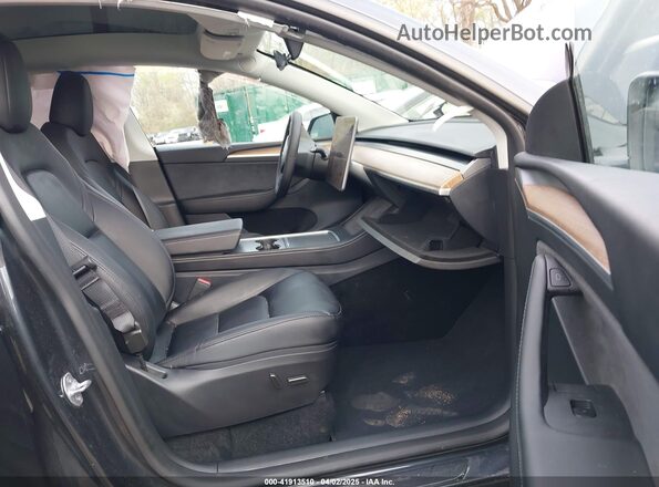 7SAYGDEE7SF287094 2025 TESLA MODEL Y Gray Widok wnętrza z przodu