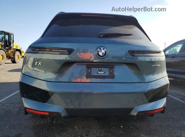 WB523CF03PCM54871 2023 BMW IX Blue Հետևի տեսք