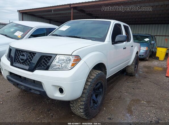 1N6ED0EB9MN706099 2021 NISSAN FRONTIER White Vista tres cuartos delantera izquierda