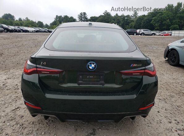 WBY33AW00RFS09877 2024 BMW I4 Green Вид ззаду