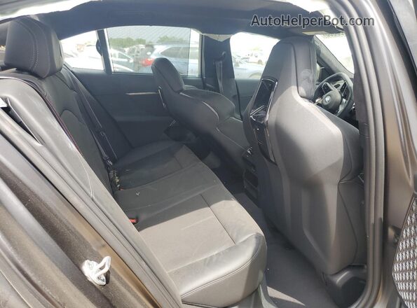 WBS83FK0XSCU02113 2025 BMW M5 Gray Vista de los asientos traseros