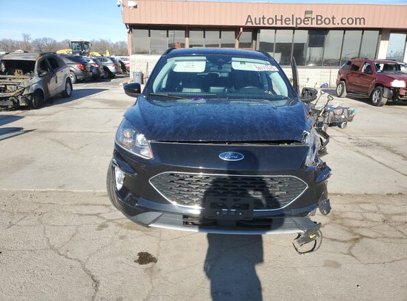 1FMCU9CZ8MUA40028 2021 FORD ESCAPE Black Front view