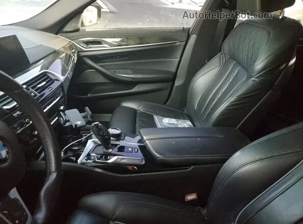 WBAJB9C50JB286445 2018 BMW M5 Gray Vista interior delantera