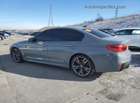 WBAJB9C50JB286445 2018 BMW M5 Gray Trasero izquierdo