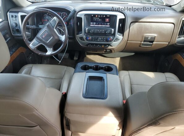 3GTU2NEC7GG194379 2016 GMC SIERRA Коричневый Вид панели приборов