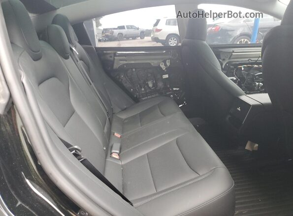 5YJ3E1EA7SF878678 2025 TESLA MODEL Black Widok tylnych siedzeń